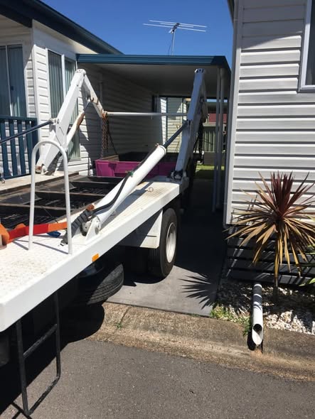 Dropping a bin beside the house